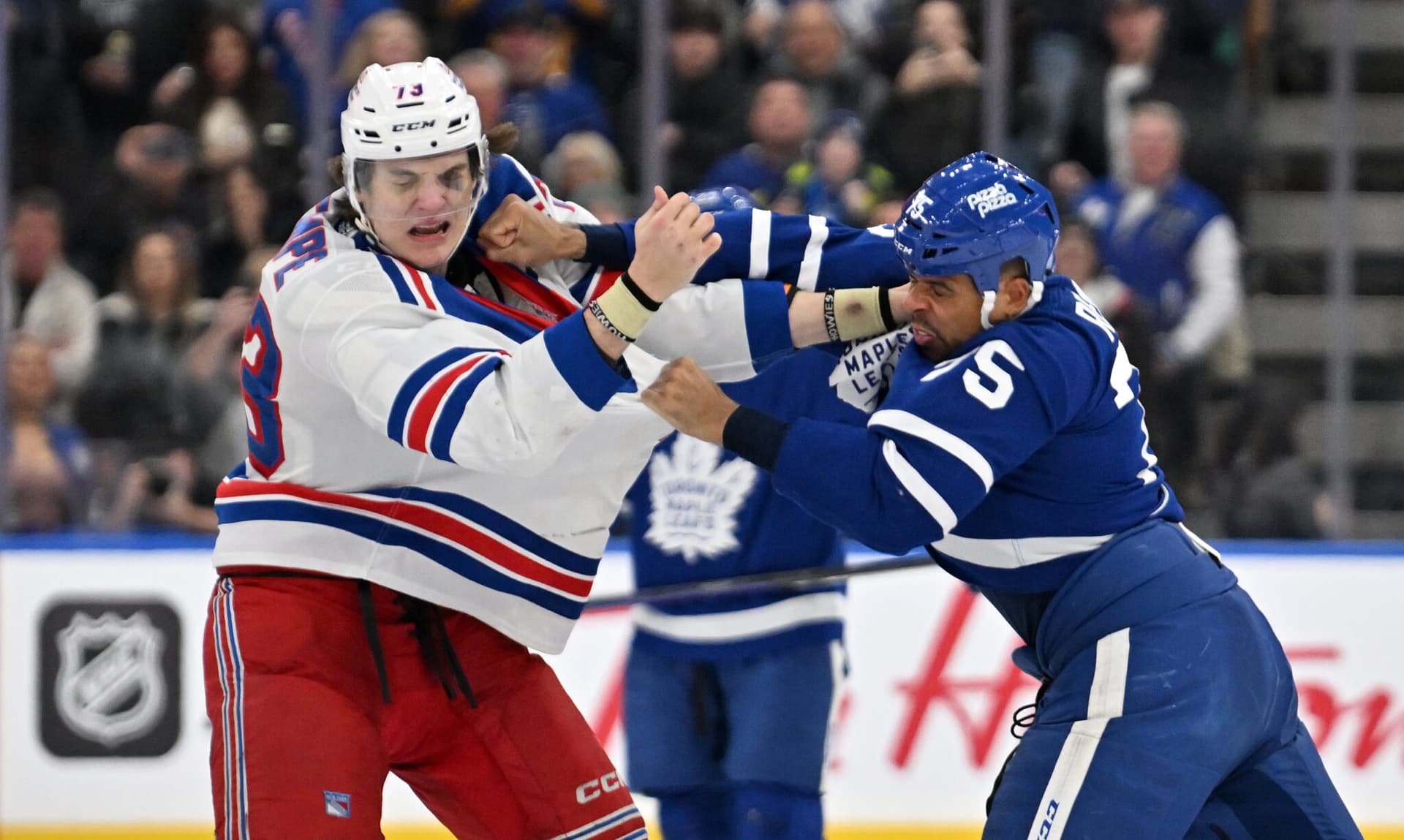 https://images.dailyhive.com/20250228094730/Matt-Rempe-Ryan-Reaves-Dan-Hamilton-Imagn-Images.jpg