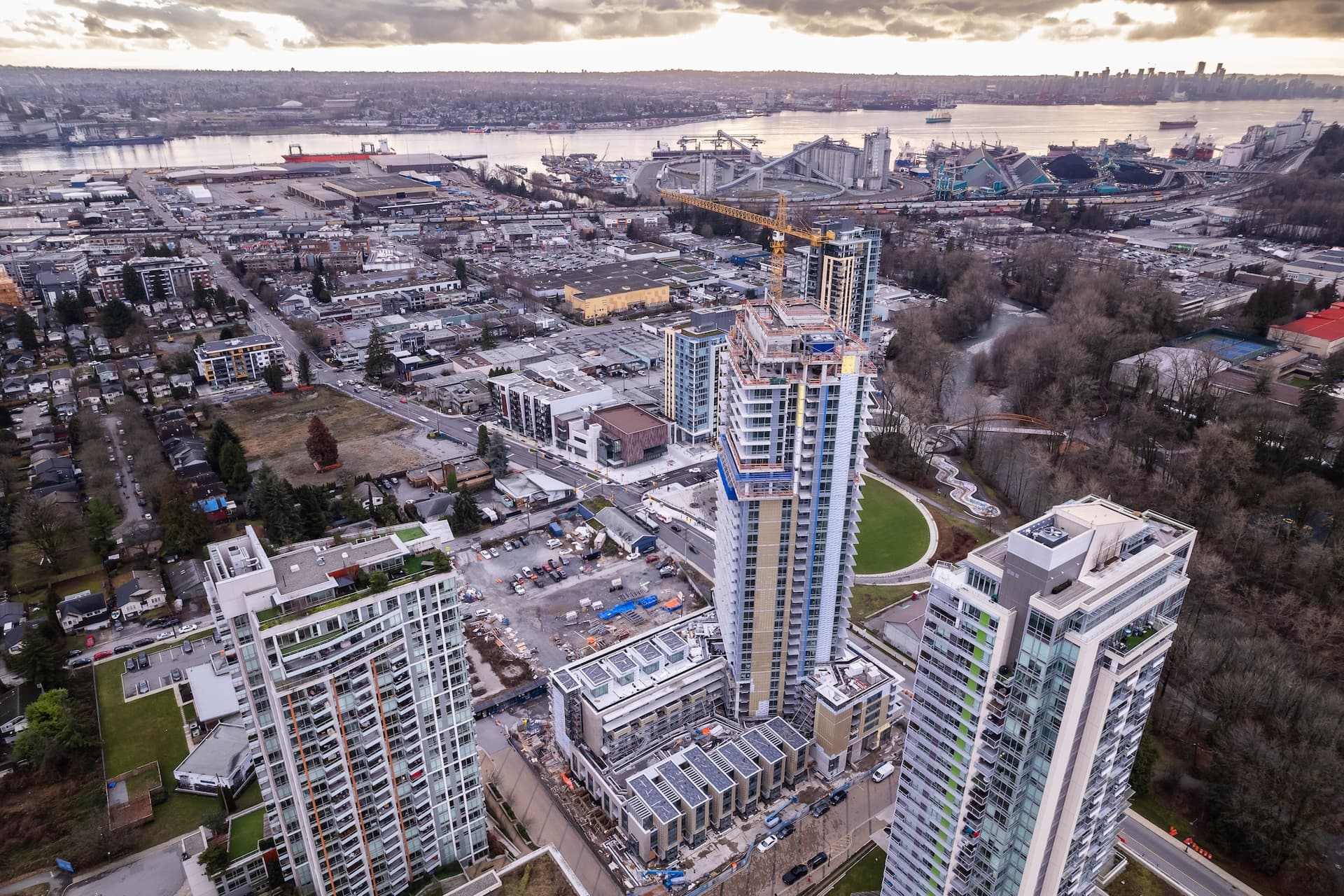 https://images.dailyhive.com/20250317132038/north-vancouver-tower-construction-crane-f.jpg