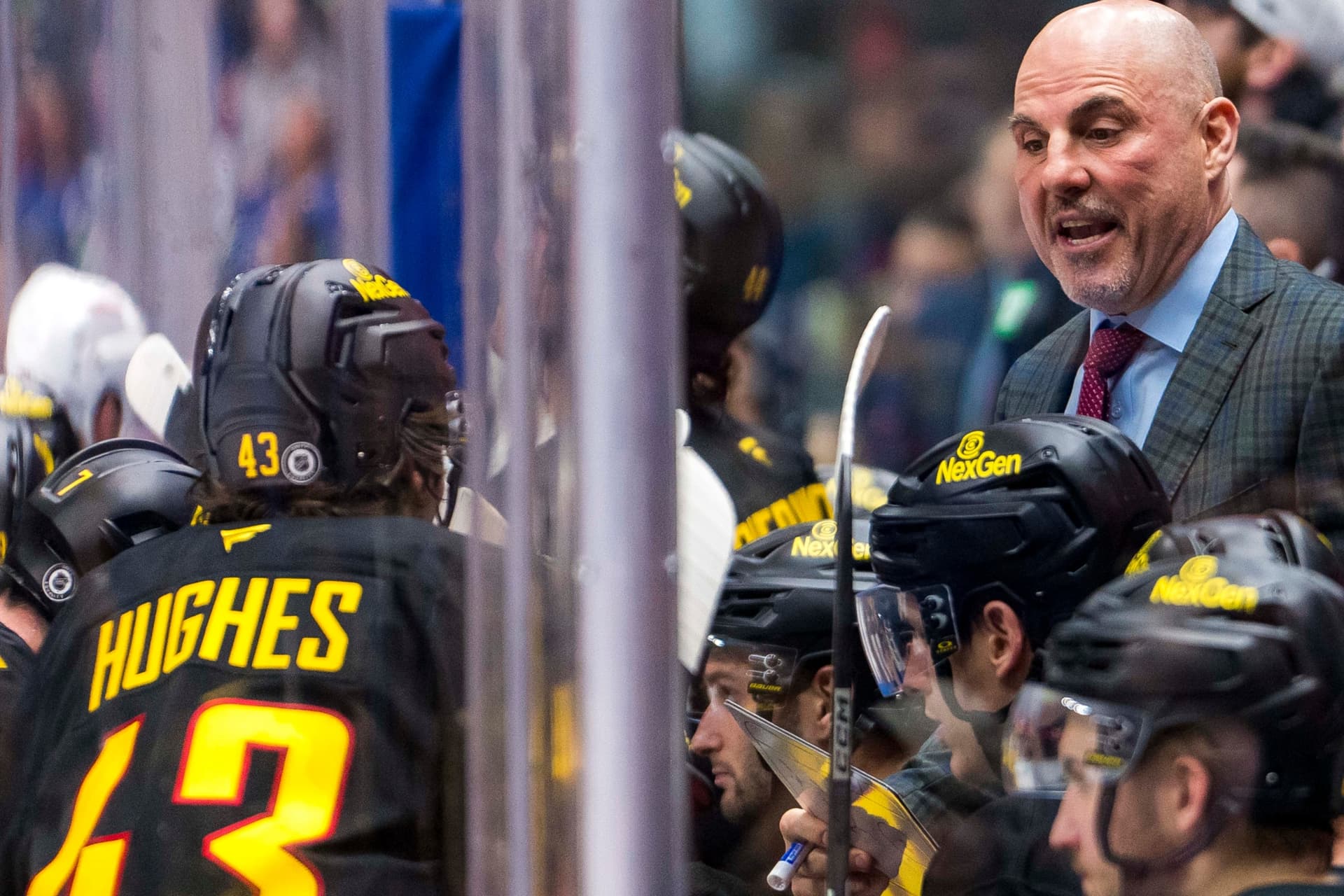 https://images.dailyhive.com/20250409155050/Hughes-Tocchet.jpg
