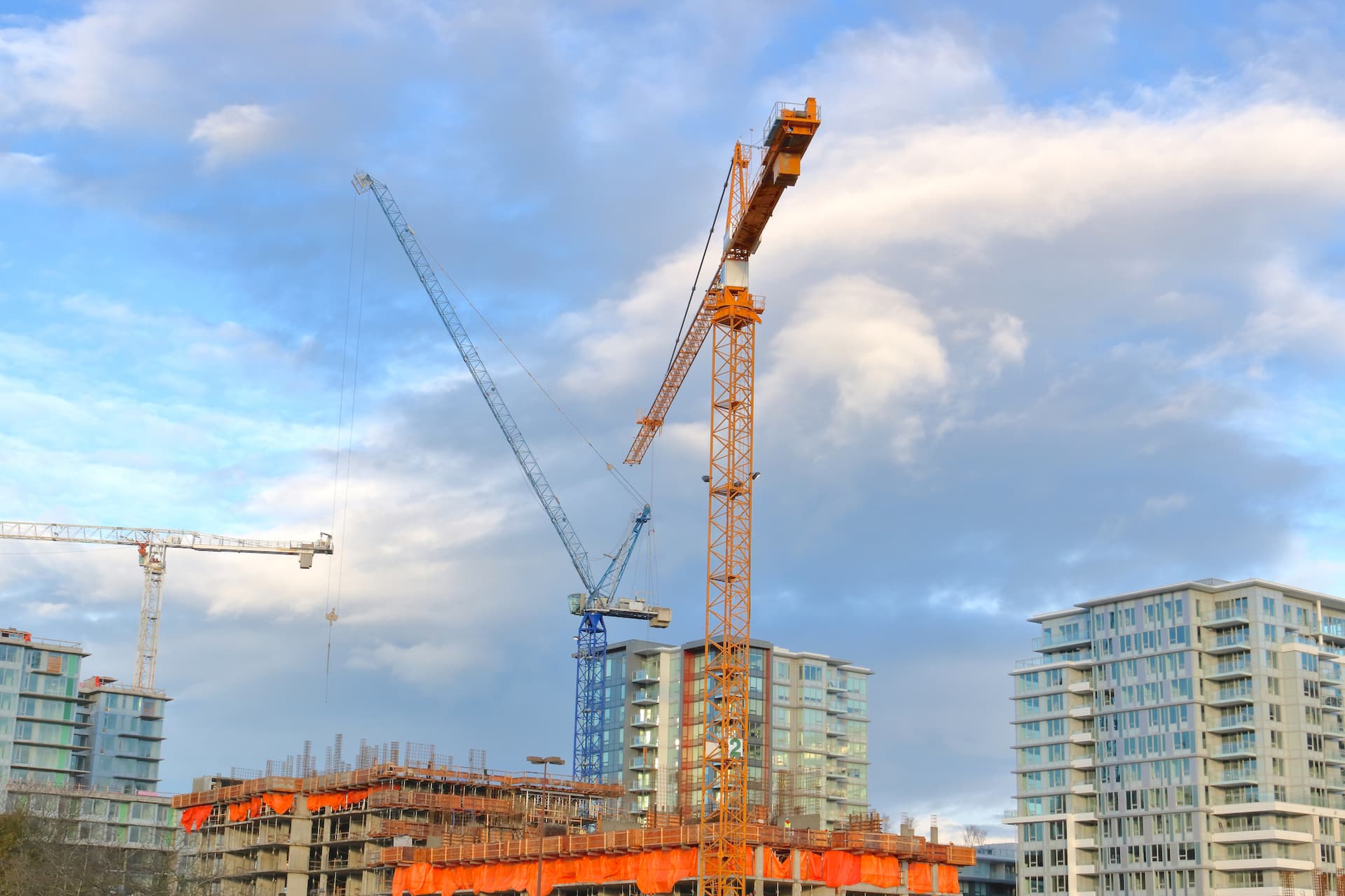 https://images.dailyhive.com/20250416140127/vancouver-building-construction-crane-f.jpg