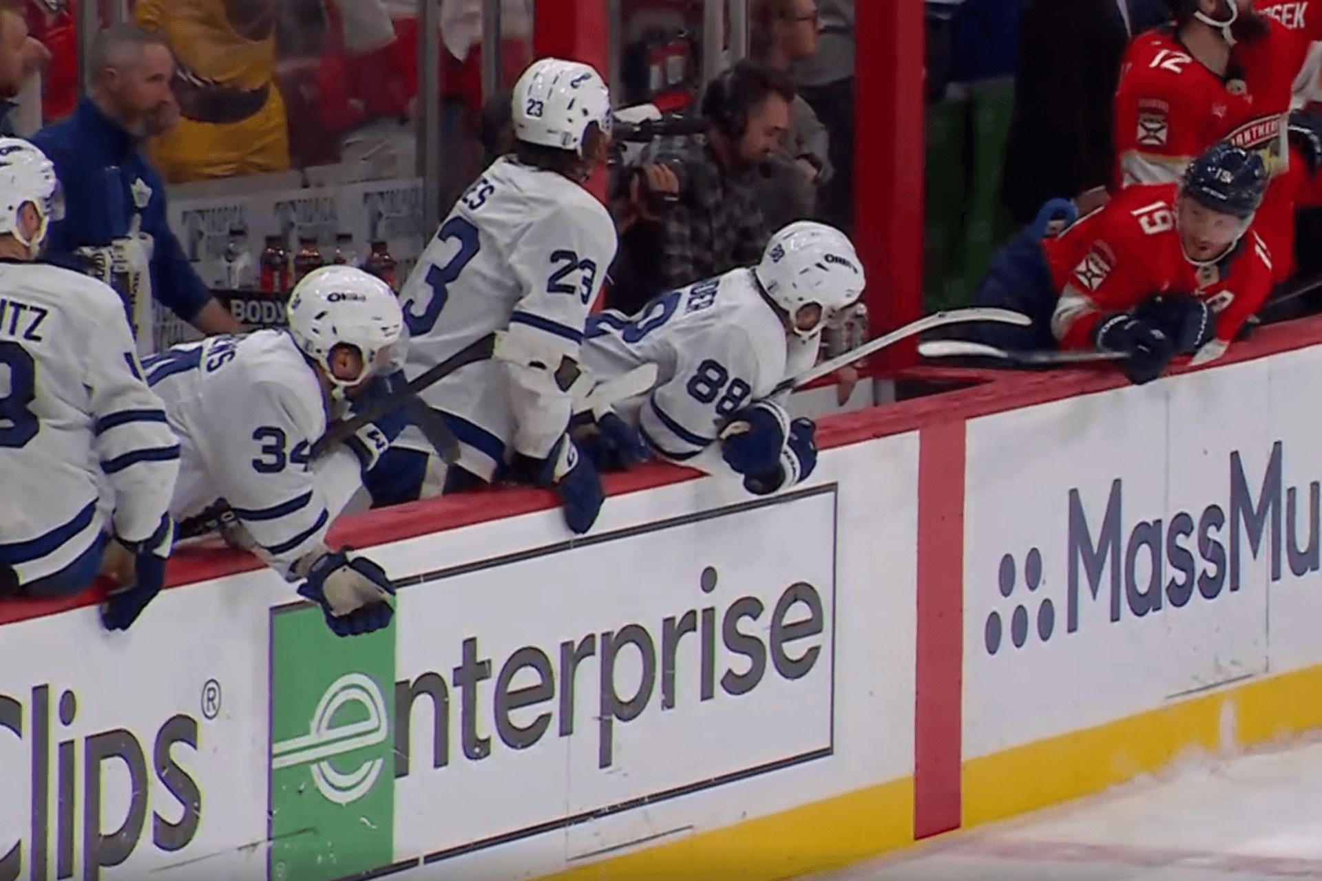 https://images.dailyhive.com/20250511215613/tkachuk-leafs-bench.png