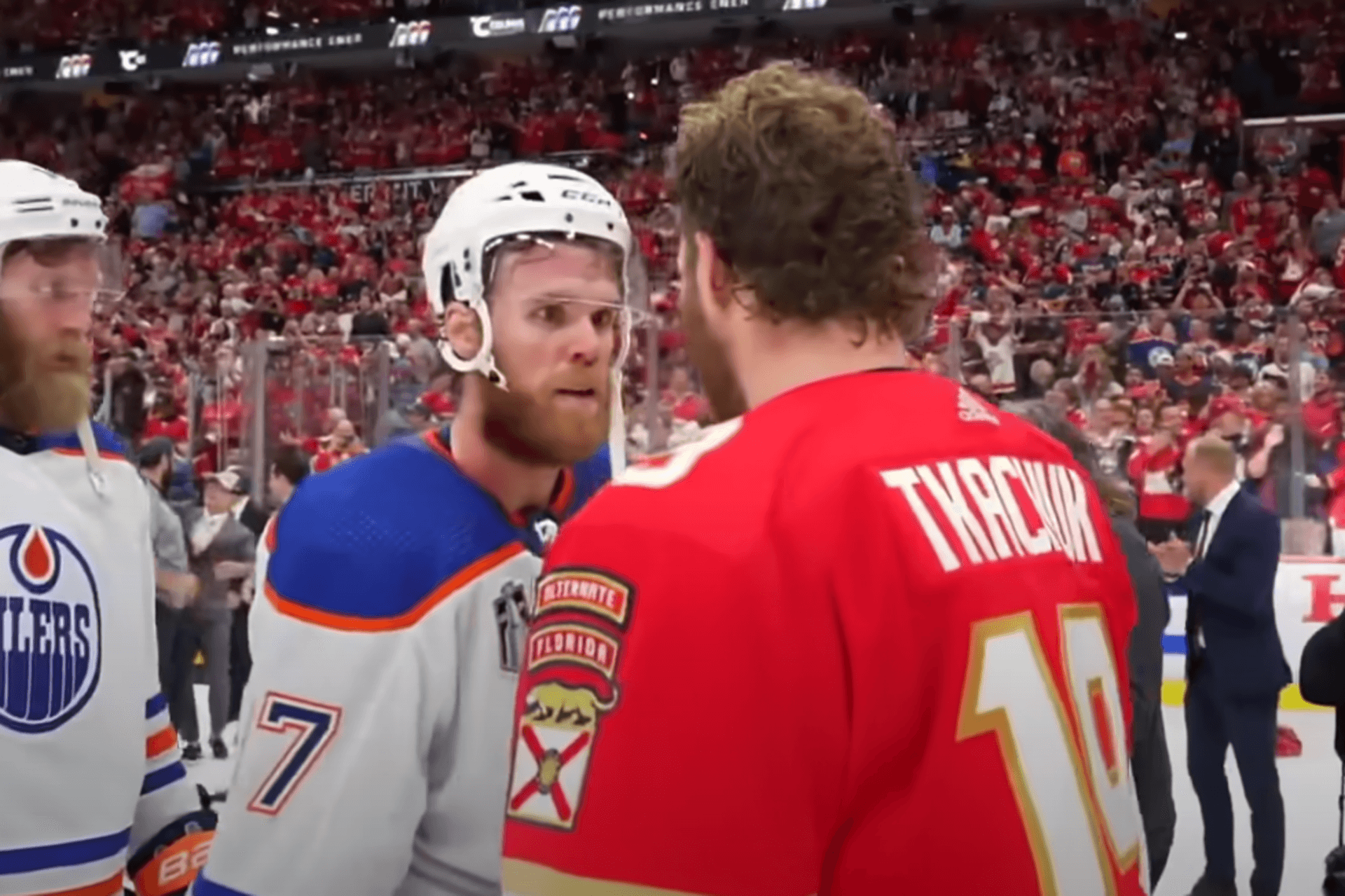 https://images.dailyhive.com/20250530073414/oilers-mcdavid-tkachuk-handshake.png