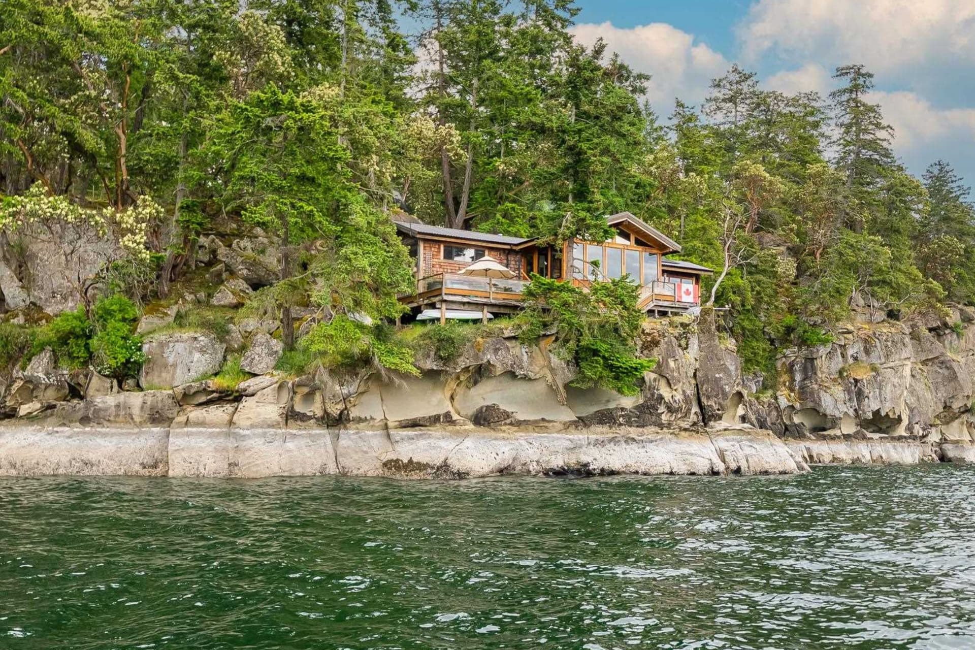 https://images.dailyhive.com/20250618112407/remote-bc-island-property-sale.jpg