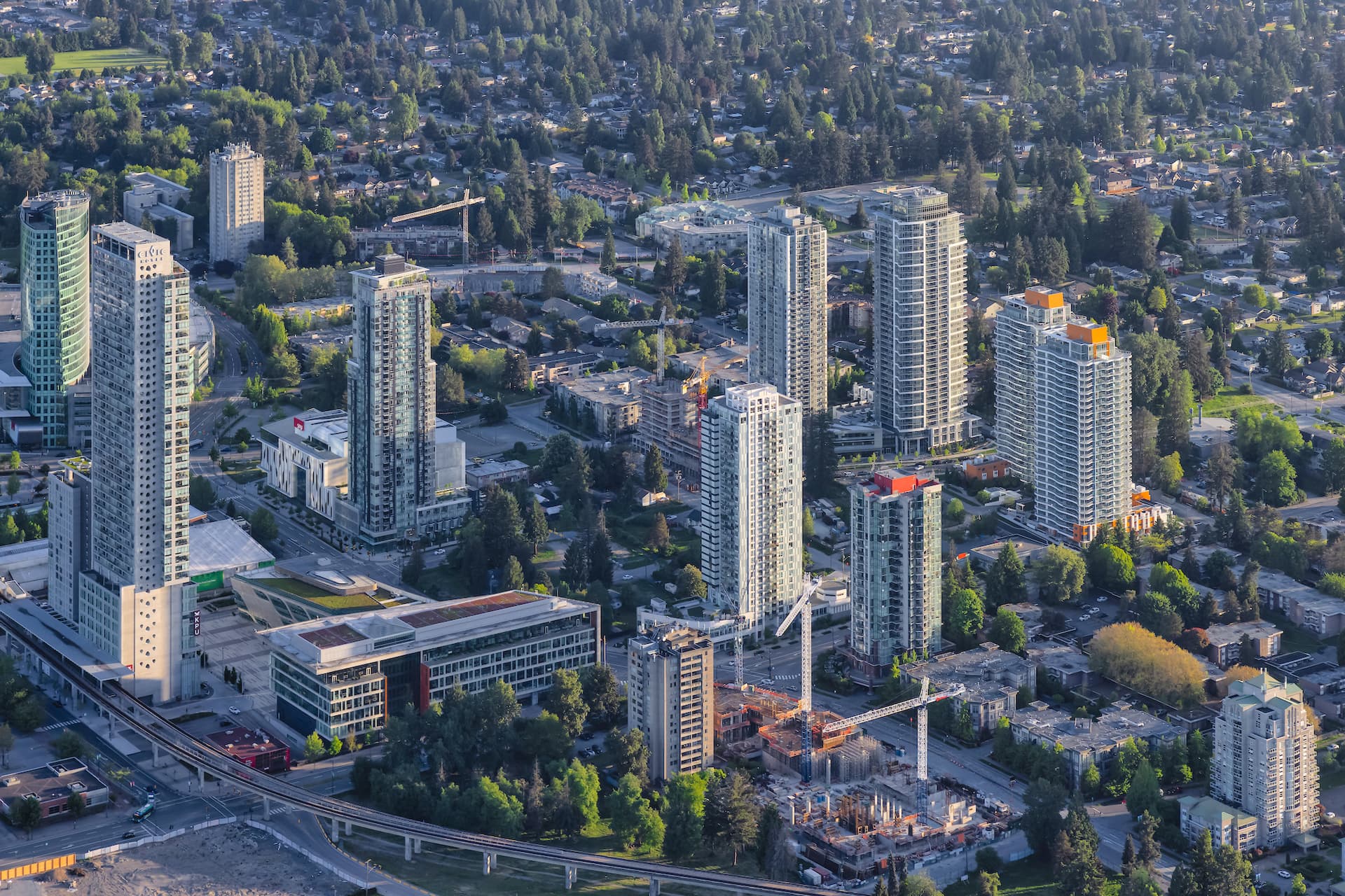 https://images.dailyhive.com/20250716191635/surrey-city-centre-skyline-downtown-construction-f.jpg