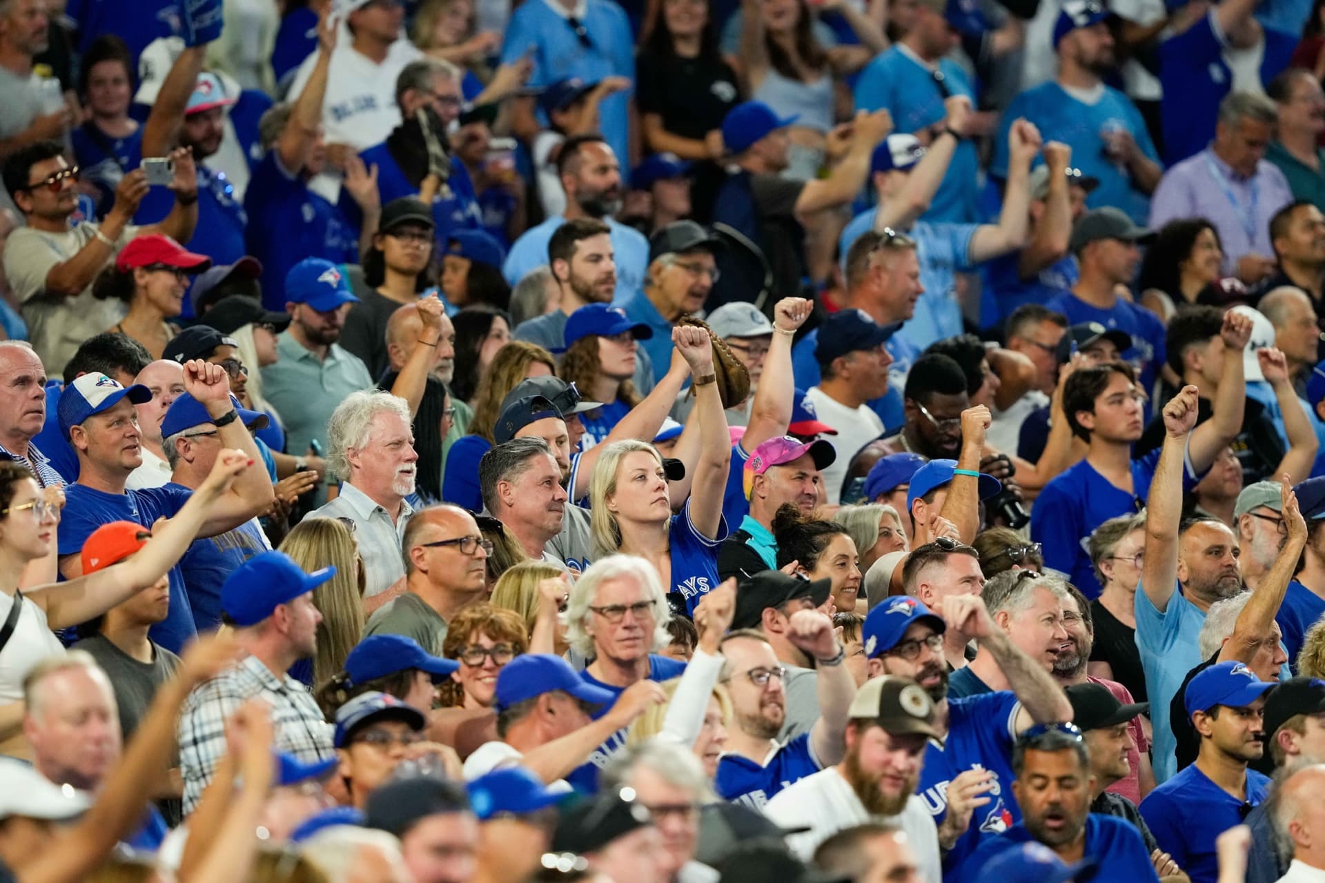 https://images.dailyhive.com/20250722141932/blue-jays-fans-2.jpg