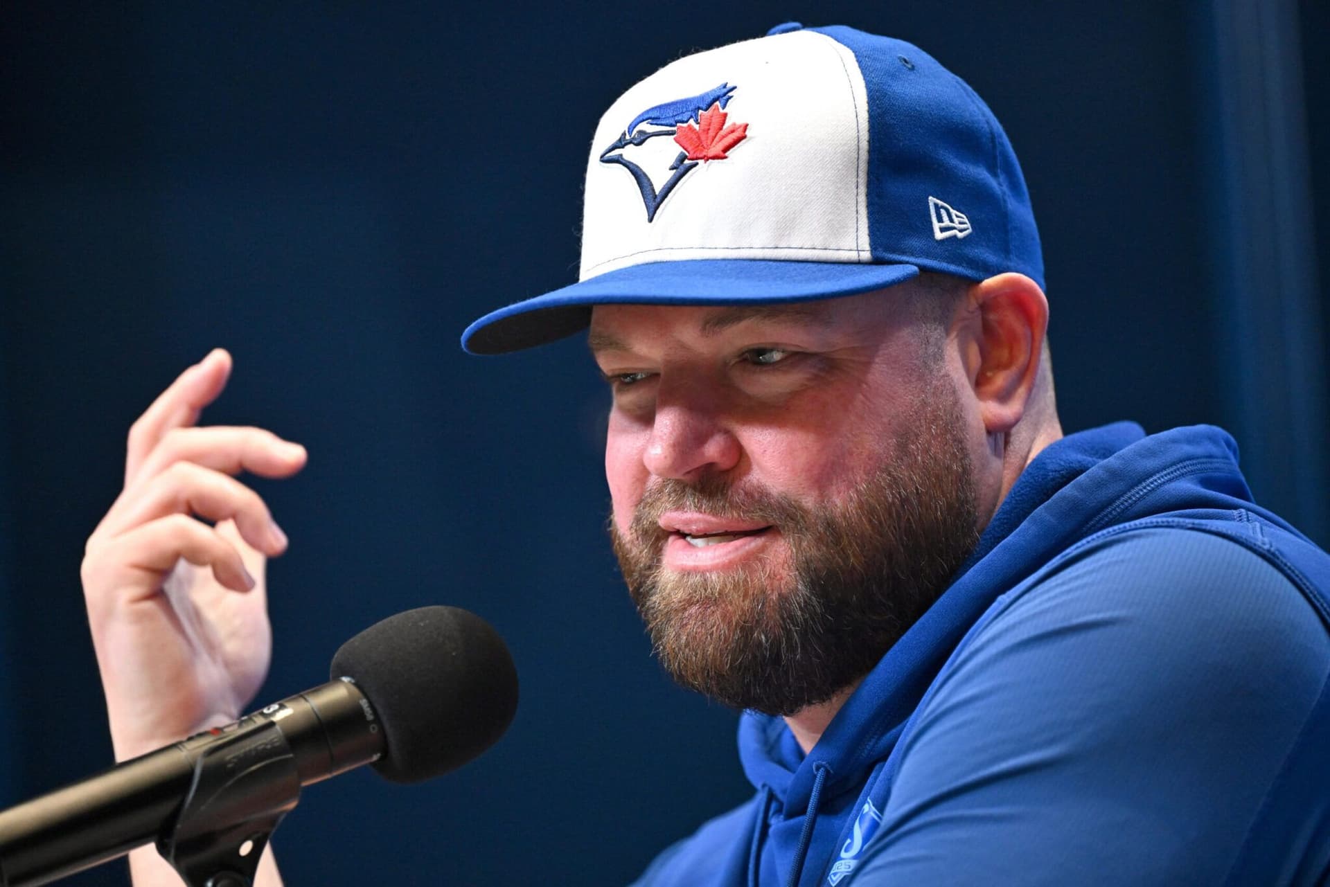 https://images-dh-production-baselayer.dailyhive.com/uploads/2025/10/john-schneider-blue-jays-game-2-scaled-e1761449998215.jpg